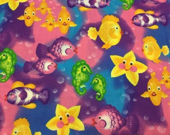 Donna Dewberry Bright Colorful Fish fabric.    35” lot
