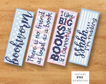 May include: Four rectangular cross-stitch bookmarks featuring dark blue text on light blue and pink backgrounds. The text reads Bookworm, There is no friend as loyal as a book, I like big BOOKS & I cannot lie, and Shhh... I'm reading.