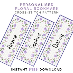 Könnte beinhalten: Drei personalisierte Blumenlesezeichen mit den Namen Annie, Sophia und Daisy in einem Kreuzstichmuster. Die Lesezeichen haben einen weißen Hintergrund mit einem floralen Rand in Lila und Rosa. Der Text oben lautet "PERSONALISIERTES BLUMENLESEZEICHEN KREUZSTICHMUSTER".