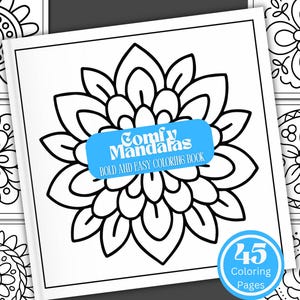 May include: A black and white mandala coloring book titled "Comfy Mandalas: Bold and Easy Coloring Book." The cover features a large floral mandala design. The book has 45 coloring pages.