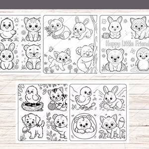 May include: Black and white illustrations of various animals, including a chick, kitten, panda, bunny, fox, koala, bear, and penguin. The phrase "Happy Little Friends" is written on one of the illustrations. The images are arranged on a light wood-grain surface.