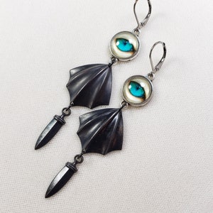 Turquoise Eyes earrings, Black baby Dragon Wings, black Daggers, Goth, Oddities, Curiosities Jewelry