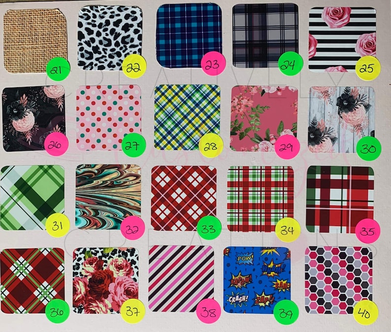 May include: A collection of 40 different patterned fabric swatches. The swatches are arranged in a grid of 5 rows and 8 columns. The patterns include plaid, polka dots, stripes, floral, and abstract designs. The swatches are all different colors, including red, green, blue, pink, and black.
