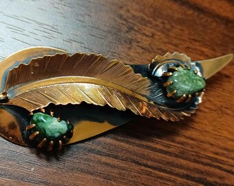 Large Leaf Brooch With Two Individually Pronged Green Stones And A Rollover Clasp. Unsigned  #498