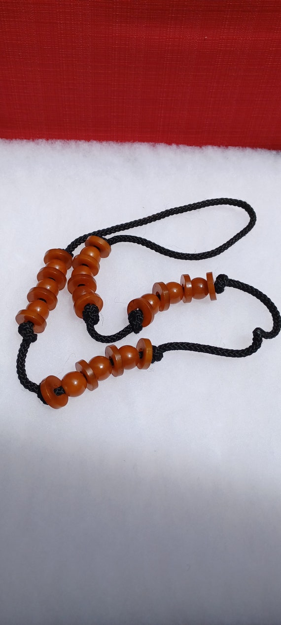 Vintage Bakelite Necklace with Round and Flat Butt