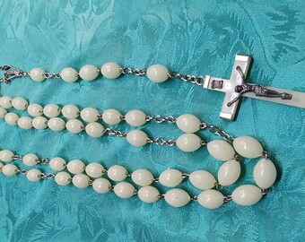 A Vintage Italian Silvertone and Lucite Glow in the Dark Rosary With Crucifix marked Italy on reverse. #328