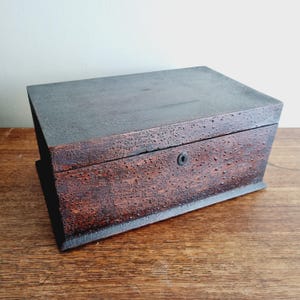 Large antique wooden storage box with honeycomb effect