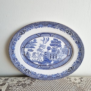 Antique blue and white medium size Willow pattern plate/platter