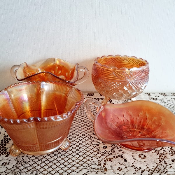 Prices vary - Vintage marigold carnival glass selection includes Dugan and Sowerby