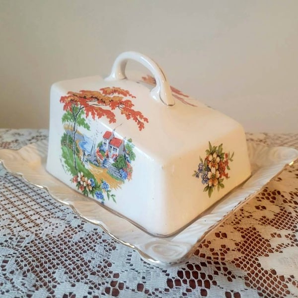 Kitsch ceramic butter dish/cheese dish by Arthur Wood with coastal cottage scene