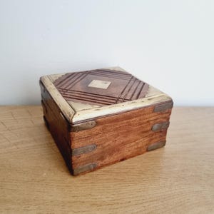 Small vintage brass bound wooden storage box