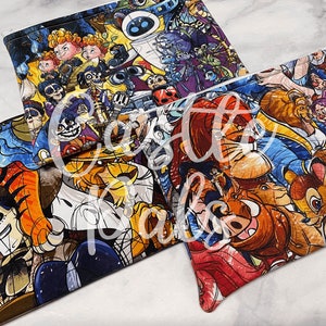 May include: Three colourful zippered pouches with a variety of Disney characters printed on them. The pouches feature characters from Toy Story, The Lion King, and Beauty and the Beast.