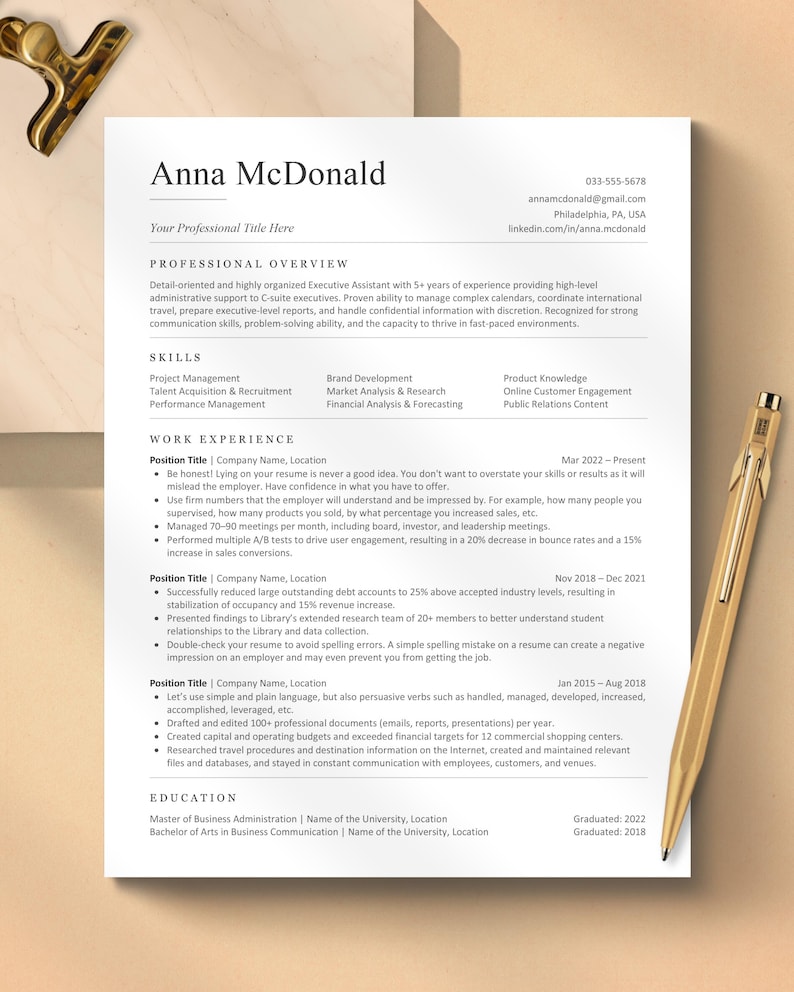 May include: A professional resume for Anna McDonald, featuring her name, contact information, and a summary of her experience as an Executive Assistant. The resume highlights skills, work experience, and education, with a gold pen in the corner.