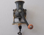 Antique black cast iron coffee grinder