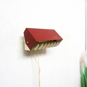1950s Vintage dutch wall lamp with a burgundy red shade that can be adjusted, Dutch design from the 1950s, tilted, white