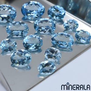 Naturlig himmelsblå topas lös transparent ädelsten för infattningar fasetterad oval form olika storlekar grossistparti WP0007E