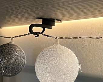 Set of 4 magnetic fairy light hooks, rubberized, including adhesive bases (Item No. 479)