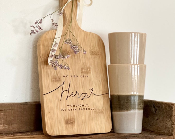 Bamboo cutting board with handle no. 615 TAAVI Where your heart feels comfortable, there is your home