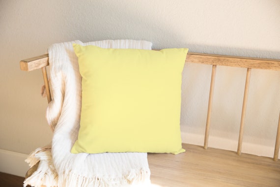 pale yellow throw pillows