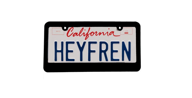 May include: A black license plate frame with a white background. The plate says "California" in red cursive and "HEYFREN" in blue block letters.
