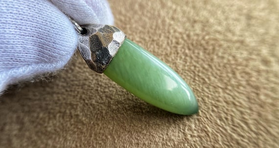 Nephrite, Jade Pendant, Nephrite with the effect of a cat's eye