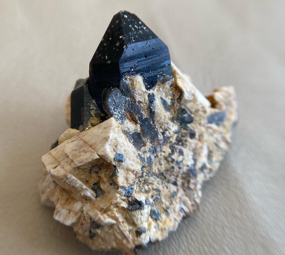 Morion crystals on spar