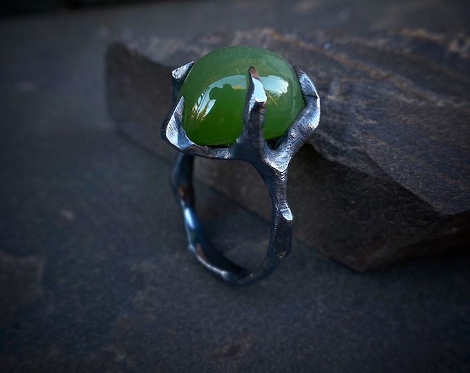 Ring with jade cat's eye