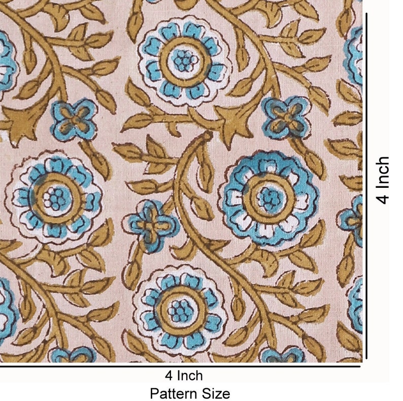 May include: A 4-inch square fabric with a repeating pattern of blue and brown floral designs on a light pink background.  The pattern size is 4 inches.