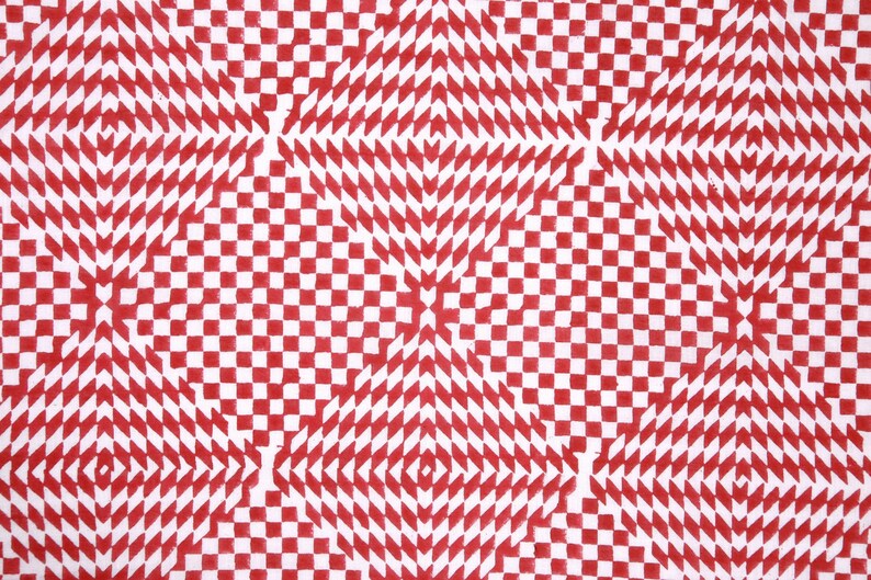 May include: A red and white checkered pattern with a repeating diamond shape design. The pattern creates an optical illusion of depth and movement.