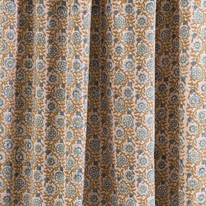 May include: A pink fabric with a repeating pattern of blue and brown floral designs.