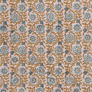 May include: A beige fabric with a repeating pattern of blue and brown floral designs. The fabric has a subtle texture and a soft, natural feel.