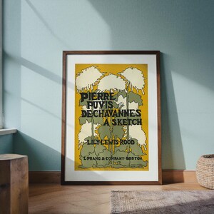 Puede incluir: Un póster vintage enmarcado con un fondo amarillo y un diseño floral. El póster presenta el texto "PIERRE PUVIS DE CHAVANNES A SKETCH" y "LILY LEWIS ROOD". El marco es de color marrón oscuro.