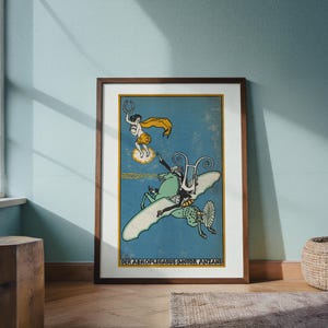 May include: Framed vintage poster with a blue background and a whimsical illustration. The artwork depicts a winged creature with a lyre, a figure in a cloud, and the text "DER AEROPLEGASUS (MOTOR ANZANI)" at the bottom. The frame is brown.