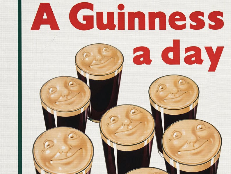 May include: Vintage advertisement featuring smiling pints of Guinness stout. The text "A Guinness a day" is displayed in red against a white background. The stout has a creamy, tan head and a dark, rich body.