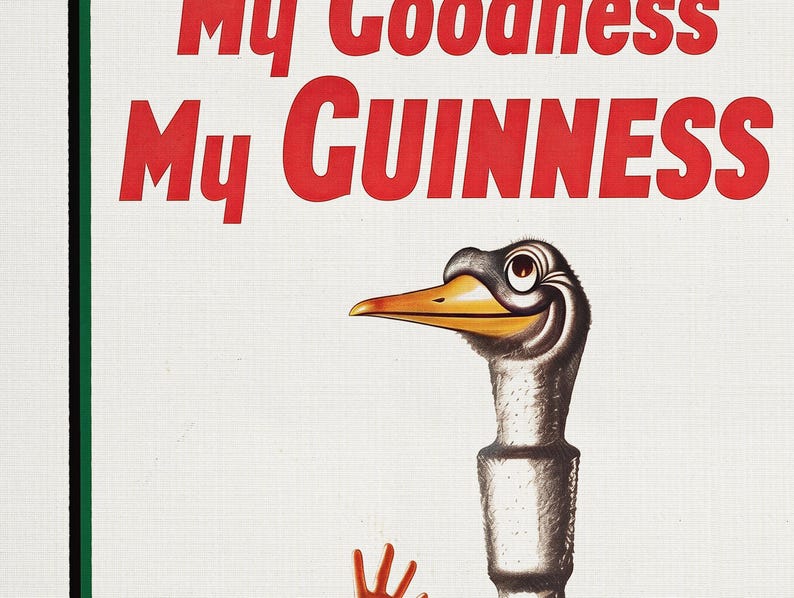 May include: Vintage Guinness advertisement featuring a cartoon ostrich with a yellow beak and a smiling expression. The text "My Goodness My Guinness" is displayed in red letters against a white background. The image has a retro style.