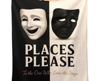 May include: A black and white blanket featuring a smiling and a sad theater mask. The text "PLACES PLEASE" is printed in large, bold letters, with "To the One Who Loves the Stage" below.