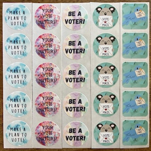 May include: A sheet of 25 colorful round stickers with various messages about voting. The stickers feature a blue bird, a koala, and a variety of colorful backgrounds. The messages include "Make a plan to vote!" "Your vote matters!" and "Be a voter!"