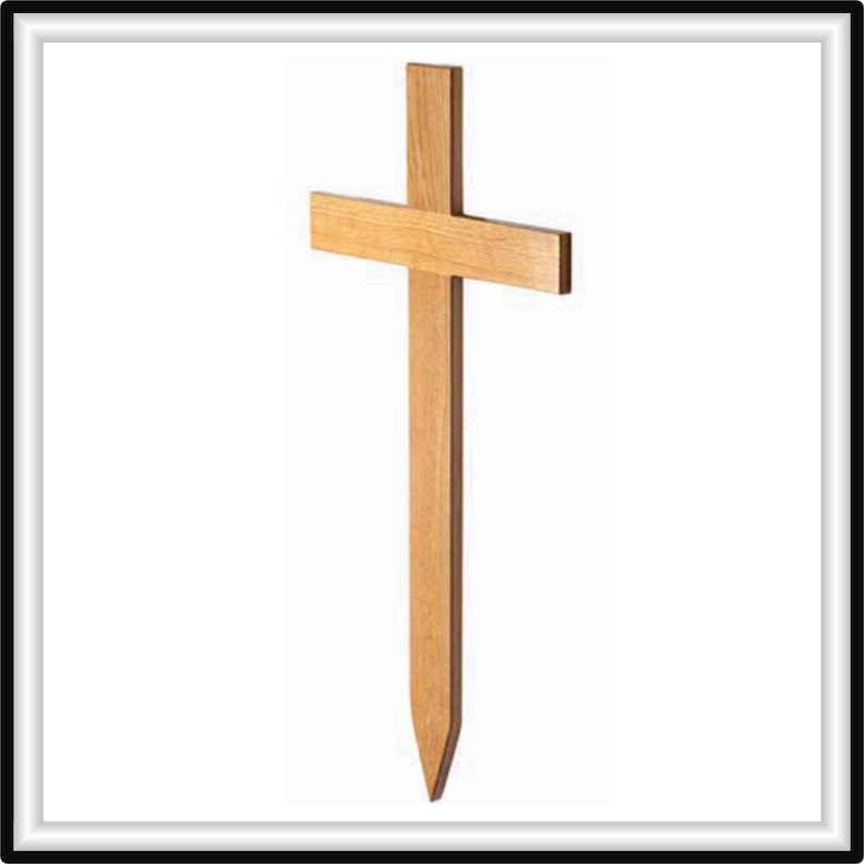 May include: A wooden cross with a pointed stake, suitable for use as a grave marker.