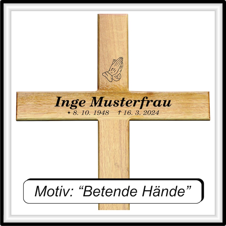 May include: A wooden cross with a black inscription that reads "Inge Musterfrau * 8. 10. 1948 &dagger; 16. 3. 2024". The cross also features a black silhouette of praying hands. A smaller plaque below reads "Motiv: "Betende H&auml;nde"".