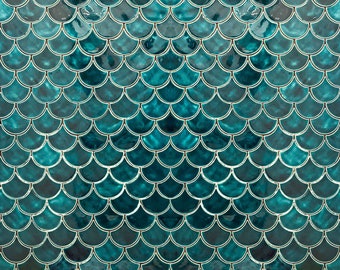 May include: A close-up of a teal-colored, scale-patterned tile. The scales have a glossy finish and are outlined with a thin white border. The design creates a textured, aquatic aesthetic, reminiscent of mermaid scales.
