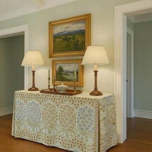 Custom console table skirt in customer own fabric (COM) fabric Lee Jofa  Sameera in Sapphire/Gold