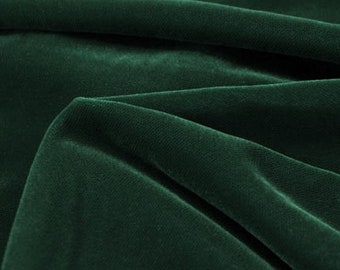 Emerald green flocked velvet upholstery fabric