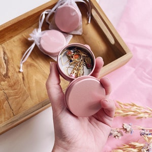 Pink round metal box for marker rings and small haberdashery