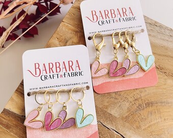 Juego de 4 anillos marcadores de puntos con forma de corazón perlado