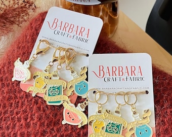 Juego de 4 anillos marcadores de puntos para tejer y crochet, pociones mágicas