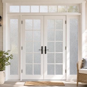 May include: A set of white double doors featuring ten glass panes each with a frosted, textured finish. The doors are equipped with black metal handles and are framed by matching side windows and a rectangular transom window above the entrance.