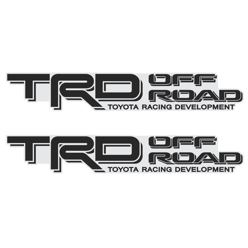 May include: Two black and white decals with the text "TRD OFF ROAD" and "TOYOTA RACING DEVELOPMENT" underneath.