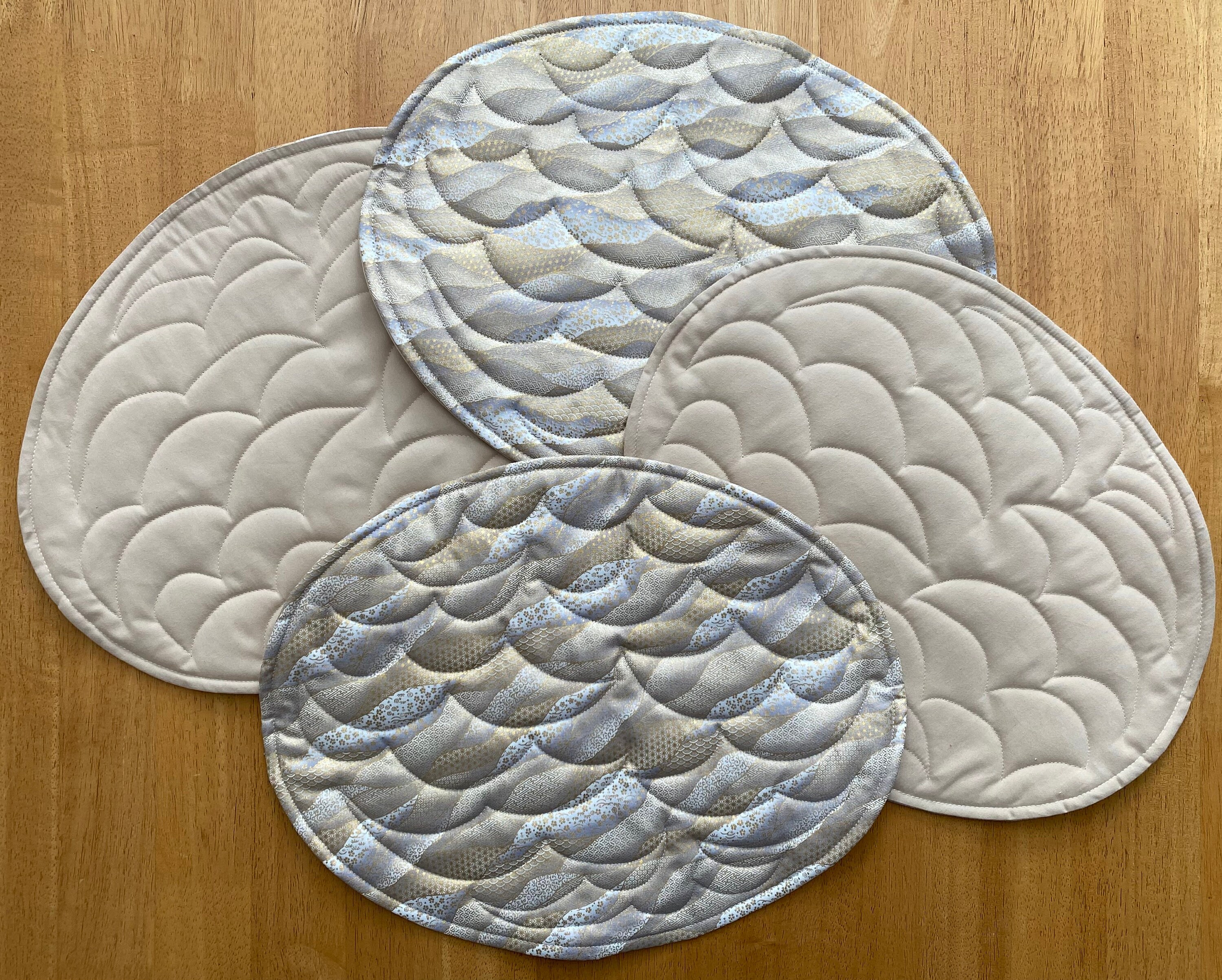 Gold Waves Oval Quilted Placemats, Set of 4, Flowers, Curls, Stars
