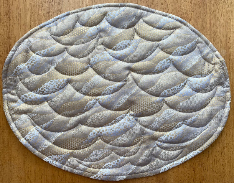 Gold Waves Oval Quilted Placemats, Set of 4, Flowers, Curls, Stars