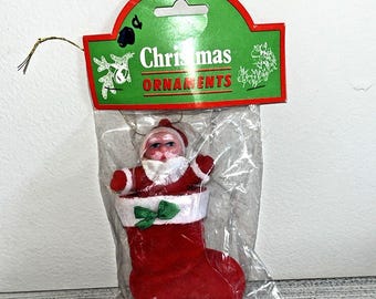 Vintage Flocked Santa Claus  in Stocking Ornament Sealed Christmas NOS Nice 4"